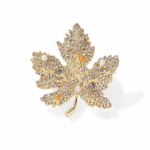 Broșă frunză aurie cu cristale și perle decorative